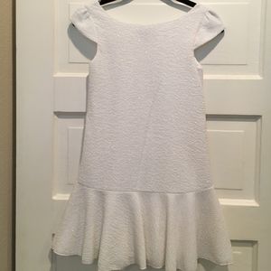 Girls white with gold sparkles party dress.